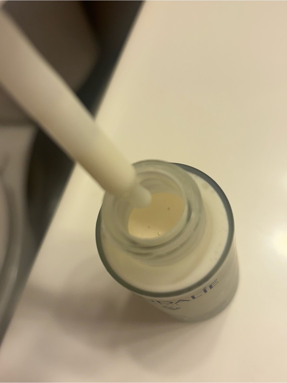 Caudalie Brightening Serum Bottle in White and Blue - Picture 2 of 3
